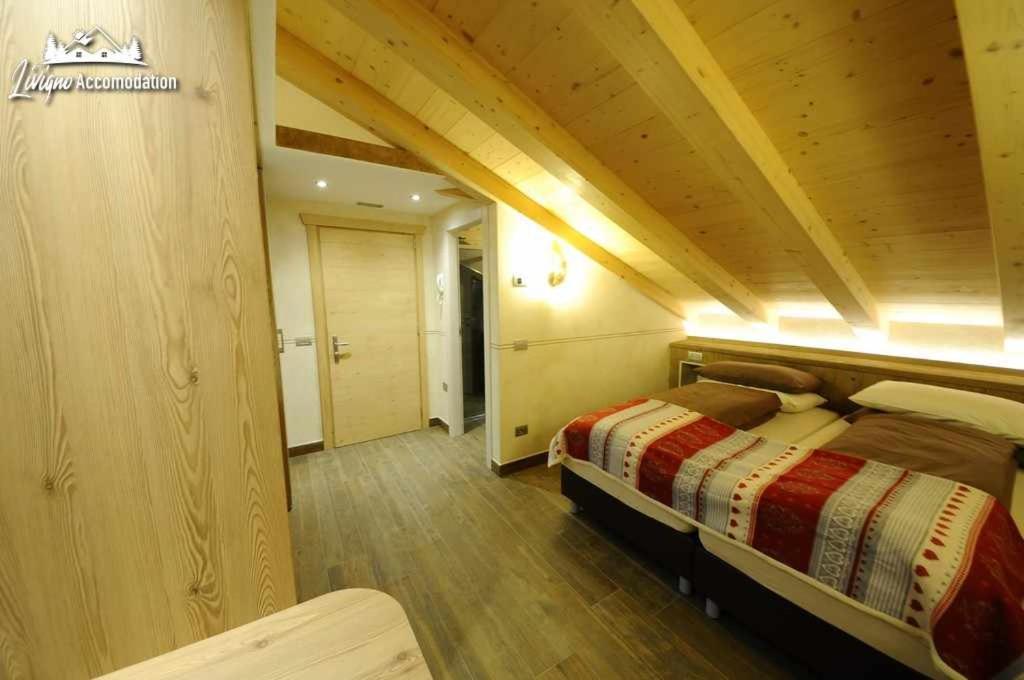 Alpen Flower By Livigno Accomodation Habitación foto